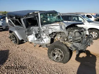 2015 Jeep Wrangler Unlimited Sahara z VIN 1C4BJWEG1FL617428, wystawiony jako Copart lot #55850005 z przebiegiem Nie podano mil oraz Szkoda całkowita • Salvage title. Historia ofert i sprzedaży dostępna na DreamBid. Obrazek 4.