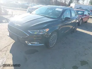 2017 Ford Fusion Energi Titanium with VIN 3FA6P0SU2HR309895, listed as a IAAI auction lot 40963527 with NaN miles. Bid and sale history available at carsss.com. Image 17.