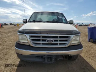 1999 Ford F-150 with VIN 2FTRX17L0XCA37979, listed as a Copart auction lot 58216695 with 256,055 mi miles and Clean title. Bid and sale history available at DreamBid. Image 5.
