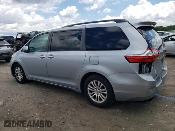2015 Toyota Sienna XLE with VIN 5TDYK3DC0FS592251, listed as a Copart auction lot 60126165 with 118,925 mi miles and Salvage title. Bid and sale history available at DreamBid. Image 2.