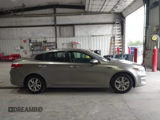 2016 Kia Optima LX with VIN 5XXGT4L33GG026183, listed as a IAAI auction lot 42156799 with 163,000 mi miles and . Bid and sale history available at carsss.com. Image 13.