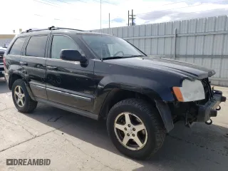2007 Jeep Grand Cherokee Laredo with VIN 1J8HR48P67C698021, listed as a Copart auction lot 50022895 with 176,120 mi miles and Salvage Title. Bid and sale history available at carsss.com. Image 4.
