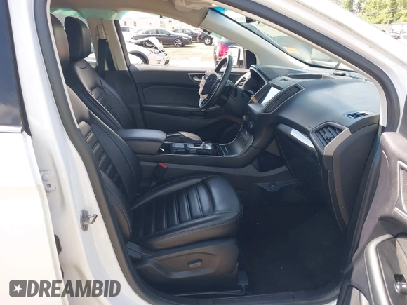 2020 Ford Edge SEL z VIN 2FMPK4J90LBA28960, wystawiony jako IAAI lot #42264189 z przebiegiem 91 312 mil mil oraz . Historia ofert i sprzedaży dostępna na DreamBid. Obrazek 5.