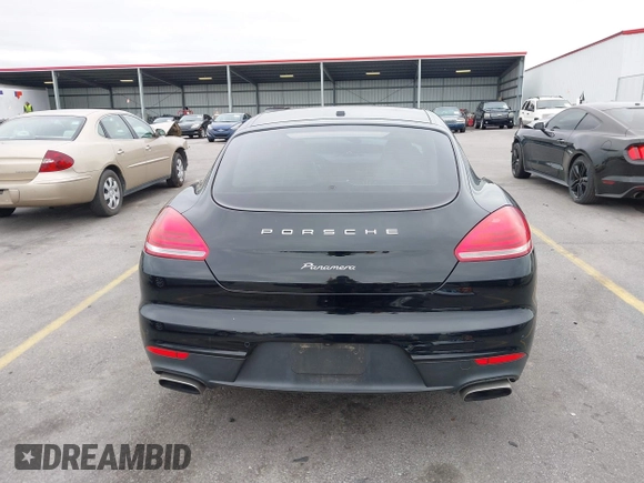 2015 Porsche Panamera 4 с VIN WP0AA2A70FL002802, выставлен на аукционе IAAI как лот 41303802 с пробегом 58 496 миль миль и . История ставок и продаж доступна на DreamBid. Изображение 16.