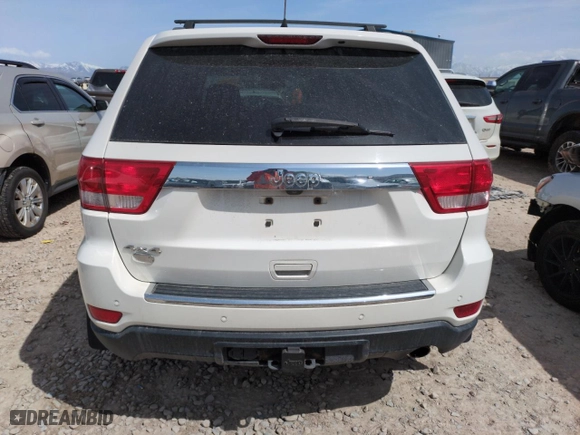 2012 Jeep Grand Cherokee Overland with VIN 1C4RJFCG9CC199486, listed as a Copart auction lot 51942135 with 113,098 mi miles and Salvage Title. Bid and sale history available at carsss.com. Image 6.