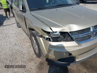 2011 Dodge Journey Mainstreet with VIN 3D4PG1FGXBT518436, listed as a IAAI auction lot 41794653 with 231,800 mi miles and . Bid and sale history available at DreamBid. Image 6.