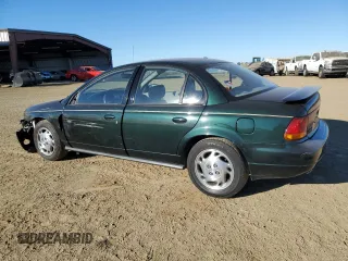 1996 Saturn SL z VIN 1G8ZK527XTZ335205, wystawiony jako Copart lot #42230735 z przebiegiem 82 344 mil mil oraz Szkoda całkowita • Salvage title. Historia ofert i sprzedaży dostępna na DreamBid. Obrazek 2.