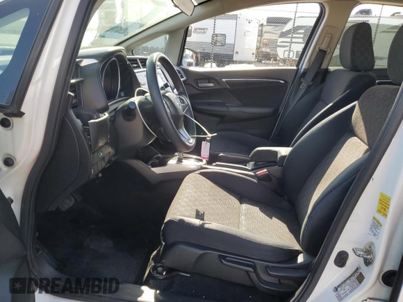 2016 Honda Fit LX z VIN JHMGK5H57GX045796, wystawiony jako Copart lot #59555545 z przebiegiem 94 235 mil mil oraz Szkoda całkowita • Salvage title. Historia ofert i sprzedaży dostępna na DreamBid. Obrazek 7.