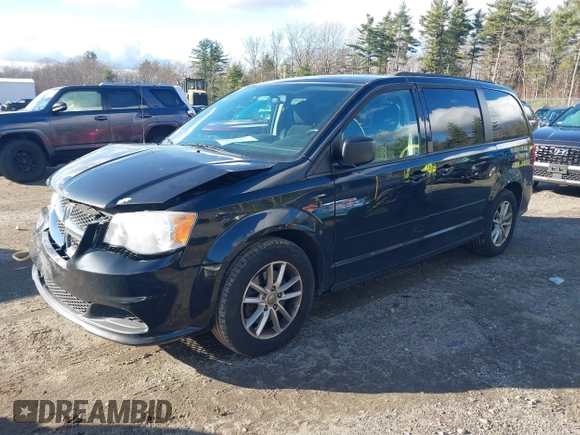 2014 Dodge Grand Caravan SXT with VIN 2C4RDGCG4ER337202, listed as a IAAI auction lot 40781755 with 258,524 mi miles and . Bid and sale history available at DreamBid. Image 2.