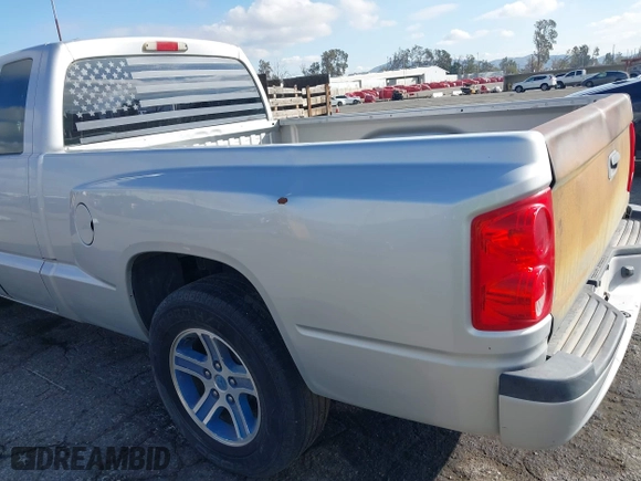 2011 Ram Dakota Bighorn/Lonestar with VIN 1D7RE3BK6BS636282, listed as a IAAI auction lot 41514885 with 295,847 mi miles. Bid and sale history available at carsss.com. Image 6.