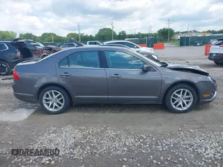 2012 Ford Fusion SEL z VIN 3FAHP0JG4CR265377, wystawiony jako IAAI lot #42221191 z przebiegiem 154 442 mil mil oraz . Historia ofert i sprzedaży dostępna na DreamBid. Obrazek 13.