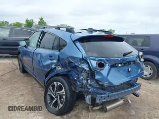 2024 Subaru Crosstrek Premium z VIN JF2GUADC6RH338290, wystawiony jako IAAI lot #42341194 z przebiegiem 10 379 mil mil oraz . Historia ofert i sprzedaży dostępna na DreamBid. Obrazek 3.