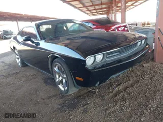 2013 Dodge Challenger SXT with VIN 2C3CDYAG1DH629087, listed as a IAAI auction lot 41993728 with 226,948 mi miles. Bid and sale history available at carsss.com. Image 1.