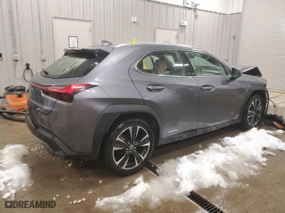 2021 Lexus UX with VIN JTHX9JBH8M2047296, listed as a Copart auction lot 87916535 with 10,297 mi miles and Salvage Title. Bid and sale history available at carsss.com. Image 3.