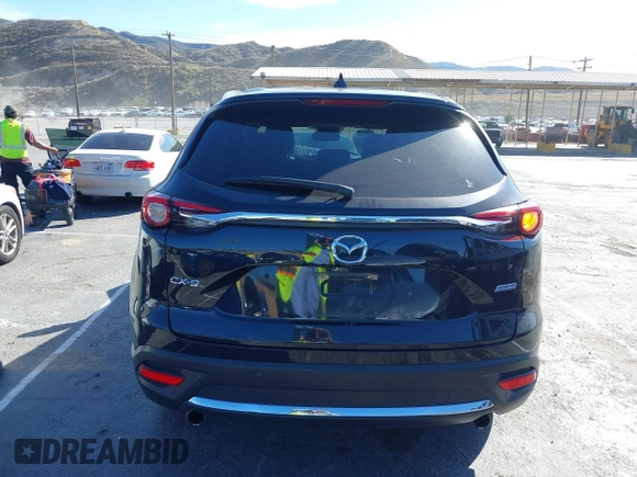 2018 Mazda CX-9 Grand Touring z VIN JM3TCADY8J0221221, wystawiony jako IAAI lot #41644721 z przebiegiem 41 510 mil mil oraz . Historia ofert i sprzedaży dostępna na DreamBid. Obrazek 16.