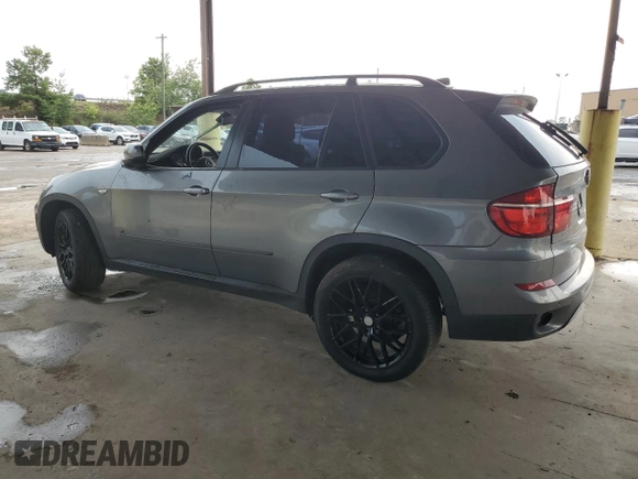 2012 BMW X5 35i with VIN 5UXZV4C56CL889802, listed as a Copart auction lot 62302265 with Not provided miles and Clean title. Bid and sale history available at DreamBid. Image 2.