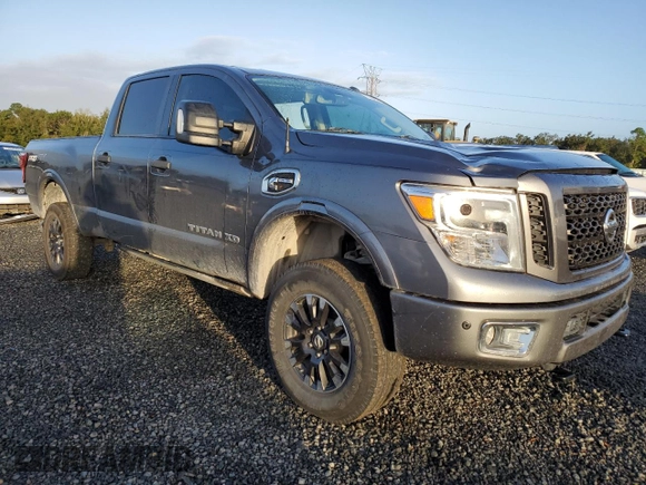 2019 Nissan Titan XD SV with VIN 1N6BA1F4XKN532266, listed as a Copart auction lot 77098244 with 105,965 mi miles and Salvage Title. Bid and sale history available at carsss.com. Image 4.