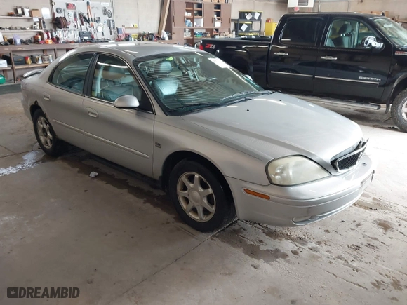 2003 Mercury Sable LS Premium with VIN 1MEFM55S63G621064, listed as a IAAI auction lot 42099656 with 182,862 mi miles. Bid and sale history available at carsss.com. Image 1.