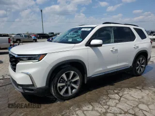 2023 Honda Pilot Elite with VIN 5FNYG1H87PB033698, listed as a Copart auction lot 52461665 with 12,457 mi miles and Salvage title. Bid and sale history available at DreamBid. Image 1.