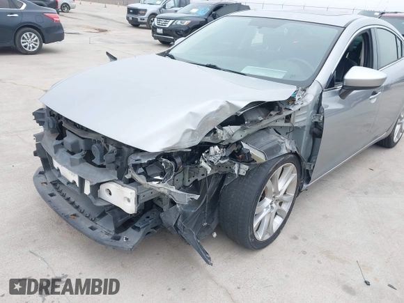 2015 Mazda 6 i Touring with VIN JM1GJ1V56F1209476, listed as a IAAI auction lot 41644215 with 112,255 mi miles. Bid and sale history available at carsss.com. Image 6.