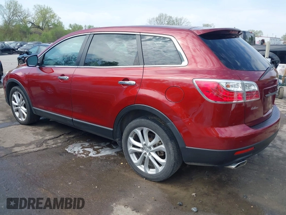 2011 Mazda CX-9 Grand Touring z VIN JM3TB2DA6B0310296, wystawiony jako IAAI lot #42022744 z przebiegiem 163 889 mil mil oraz . Historia ofert i sprzedaży dostępna na DreamBid. Obrazek 3.