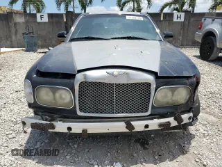 2003 Bentley Arnage z VIN SCBLF34F53CX09475, wystawiony jako Copart lot #57302795 z przebiegiem Nie podano mil oraz Czysty tytuł • Clean title. Historia ofert i sprzedaży dostępna na DreamBid. Obrazek 5.