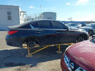 2015 Infiniti Q50 Premium with VIN JN1BV7AR6FM393586, listed as a IAAI auction lot 41683059 with 125,991 mi miles. Bid and sale history available at carsss.com. Image 13.