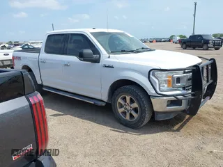 2018 Ford F-150 XL with VIN 1FTEW1E59JKF84452, listed as a IAAI auction lot 42175251 with 161,952 mi miles and . Bid and sale history available at carsss.com. Image 1.