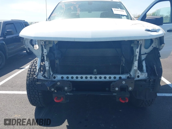 2021 Chevrolet Silverado 1500 Custom Trail Boss with VIN 1GCPYCEF1MZ413908, listed as a IAAI auction lot 41891660 with 88,335 mi miles and . Bid and sale history available at DreamBid. Image 6.