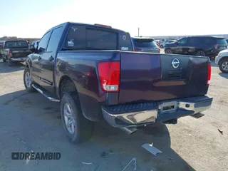 2012 Nissan Titan S with VIN 1N6AA0EJ0CN320474, listed as a IAAI auction lot 41601710 with 169,323 mi miles. Bid and sale history available at carsss.com. Image 3.