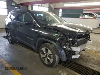 2020 Jeep Compass Latitude with VIN 3C4NJDBB3LT258349, listed as a Copart auction lot 61452715 with 80,933 mi miles and Salvage title. Bid and sale history available at DreamBid. Image 4.