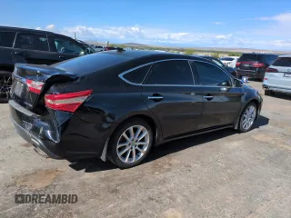 2013 Toyota Avalon XLE z VIN 4T1BK1EB1DU069566, wystawiony jako Copart lot #57236555 z przebiegiem 179 917 mil mil oraz Szkoda całkowita • Salvage title. Historia ofert i sprzedaży dostępna na DreamBid. Obrazek 3.