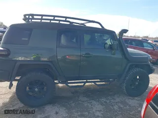 2014 Toyota FJ Cruiser with VIN JTEBU4BFXEK192640, listed as a IAAI auction lot 41349553 with 49,308 mi miles. Bid and sale history available at carsss.com. Image 13.