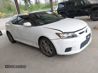 2012 Scion tC z VIN JTKJF5C78C3035194, wystawiony jako IAAI lot #42282764 z przebiegiem 146 010 mil mil oraz . Historia ofert i sprzedaży dostępna na DreamBid. Obrazek 1.