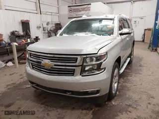 2016 Chevrolet Tahoe LTZ with VIN 1GNSKCKCXGR284827, listed as a IAAI auction lot 41389540 with 93,150 mi miles. Bid and sale history available at carsss.com. Image 2.