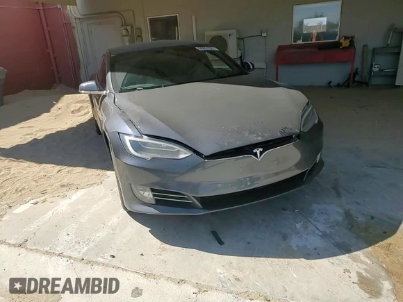 2017 Tesla Model S 60 z VIN 5YJSA1E18HF192715, wystawiony jako Copart lot #56851225 z przebiegiem 103 231 mil mil oraz Szkoda całkowita • Salvage title. Historia ofert i sprzedaży dostępna na DreamBid. Obrazek 13.