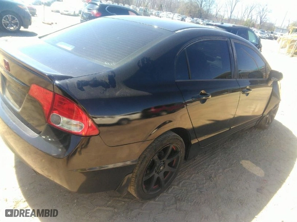 2010 Honda Civic Sdn LX with VIN 2HGFA1F58AH569158, listed as a IAAI auction lot 41823117 with 220,511 mi miles. Bid and sale history available at carsss.com. Image 4.