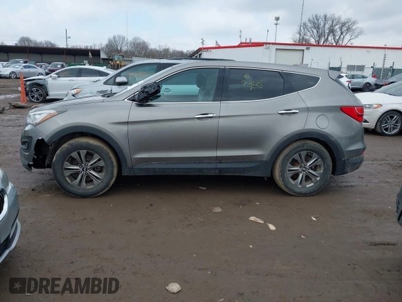 2016 Hyundai Santa Fe z VIN 5XYZTDLB1GG343763, wystawiony jako IAAI lot #41659641 z przebiegiem 96 415 mil mil oraz . Historia ofert i sprzedaży dostępna na DreamBid. Obrazek 14.