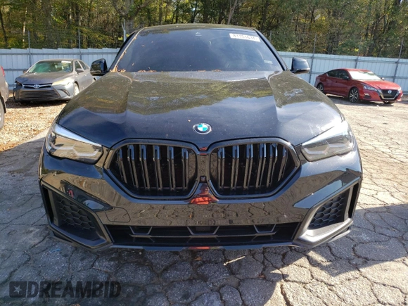 2023 BMW X6 xDrive40i z VIN 5UXCY6C04P9P46153, wystawiony jako Copart lot #81151634 z przebiegiem Nie podano mil oraz Szkoda całkowita • Salvage title. Historia ofert i sprzedaży dostępna na DreamBid. Obrazek 5.