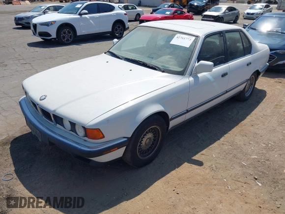 1994 BMW 7 Series z VIN WBAGD4324RDE65491, wystawiony jako IAAI lot #42761773 z przebiegiem 141 762 mil mil oraz . Historia ofert i sprzedaży dostępna na DreamBid. Obrazek 2.