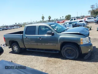 2011 Chevrolet Silverado 1500 LT with VIN 3GCPCSE02BG239588, listed as a IAAI auction lot 41963388 with 253,620 mi miles and . Bid and sale history available at DreamBid. Image 14.