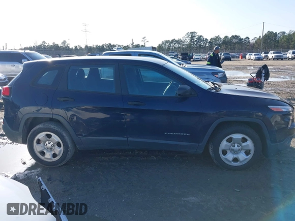 2015 Jeep Cherokee Sport with VIN 1C4PJLAB2FW547371, listed as a IAAI auction lot 41588682 with 135,640 mi miles. Bid and sale history available at carsss.com. Image 13.