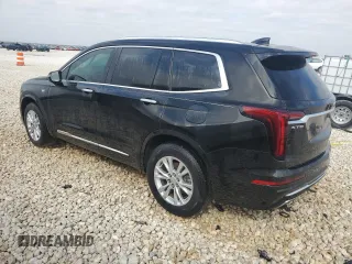 2021 Cadillac XT6 Luxury with VIN 1GYKPAR46MZ124270, listed as a Copart auction lot 44359615 with 149,820 mi miles and Clean title. Bid and sale history available at DreamBid. Image 2.