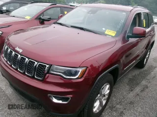 2021 Jeep Grand Cherokee Laredo X with VIN 1C4RJFAG3MC611583, listed as a IAAI auction lot 42631284 with 99,457 mi miles and . Bid and sale history available at DreamBid. Image 9.