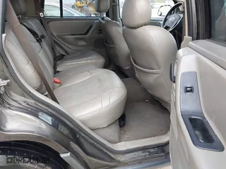 2004 Jeep Grand Cherokee Laredo with VIN 1J4GX48N74C412982, listed as a IAAI auction lot 41496258 with 195,671 mi miles. Bid and sale history available at carsss.com. Image 8.