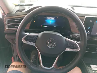 2024 Volkswagen Atlas SE with VIN 1V2HR2CA7RC565025, listed as a IAAI auction lot 42845044 with 25,080 mi miles and . Bid and sale history available at DreamBid. Image 2.