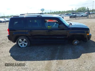 2014 Jeep Patriot Latitude with VIN 1C4NJRFB2ED501262, listed as a IAAI auction lot 42165657 with 107,551 mi miles and . Bid and sale history available at DreamBid. Image 13.