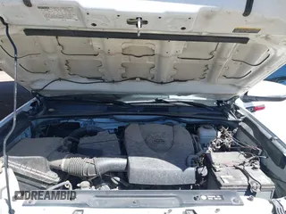 2016 Toyota Tacoma SR with VIN 5TFCZ5ANXGX028464, listed as a IAAI auction lot 41834385 with 124,407 mi miles and . Bid and sale history available at DreamBid. Image 10.