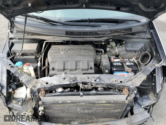 2011 Honda Odyssey LX z VIN 5FNRL5H29BB020494, wystawiony jako Copart lot #54120235 z przebiegiem 135 157 mil mil oraz Szkoda całkowita • Salvage title. Historia ofert i sprzedaży dostępna na DreamBid. Obrazek 12.