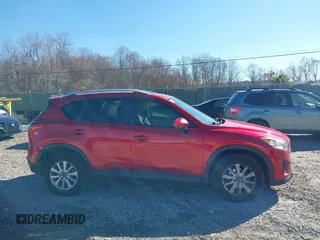 2014 Mazda CX-5 Touring с VIN JM3KE2CY7E0341630, выставлен на аукционе IAAI как лот 40830171 с пробегом 117 430 миль миль и . История ставок и продаж доступна на DreamBid. Изображение 13.